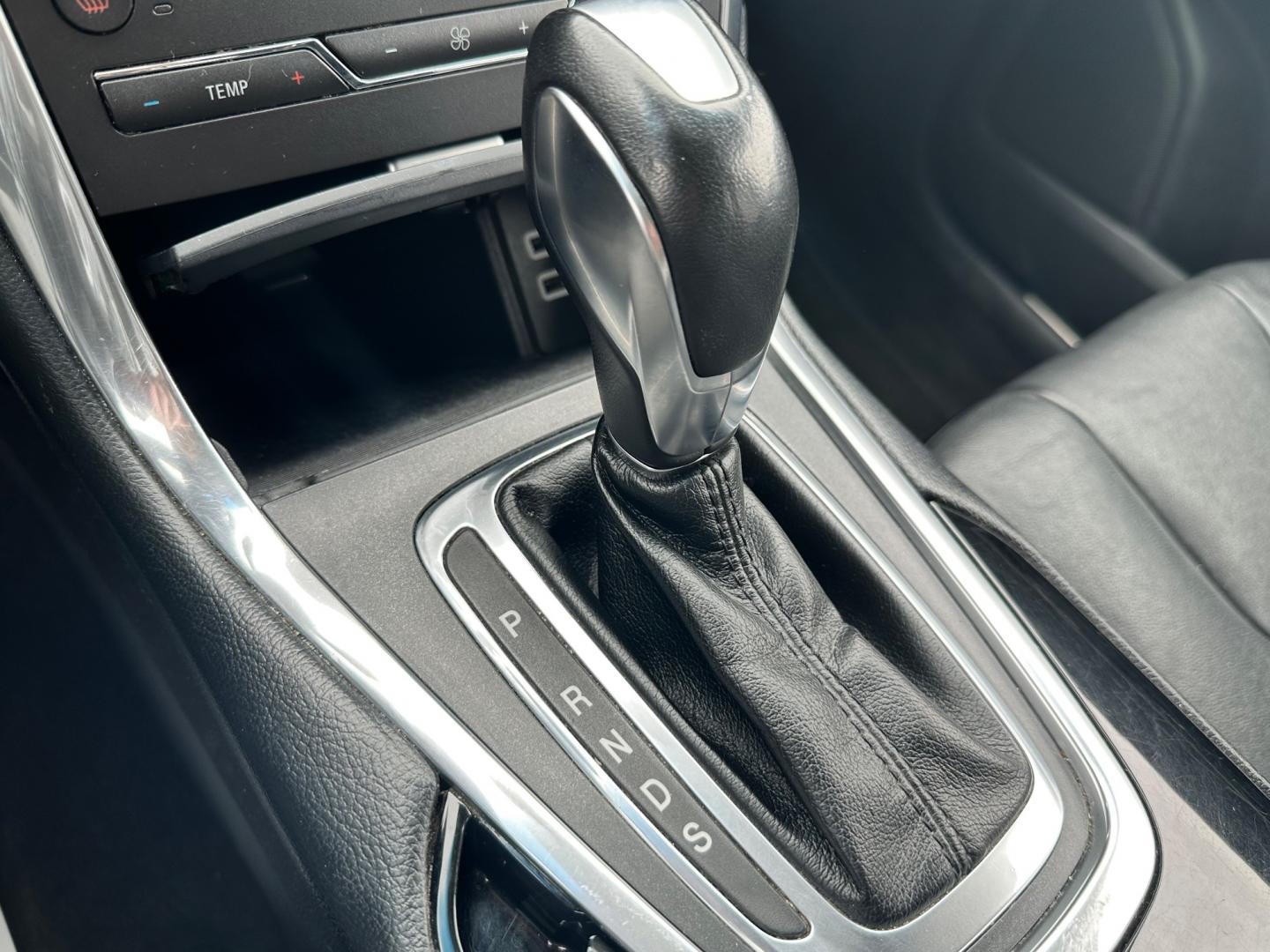 2017 Silver /Black Ford Edge Titanium (2FMPK4K92HB) with an 2.0L I4 DOHC 16V Turbo engine, 6-Speed Automatic transmission, located at 547 E. Main St., Orwell, OH, 44076, (440) 437-5893, 41.535435, -80.847855 - This 2017 Ford Edge Titanium AWD is a well-equipped midsize SUV. It comes with a powerful yet efficient 2.0L EcoBoost engine paired with a smooth 6-speed automatic transmission. Notable features include LED daytime running lights, dusk-sensing headlights, leather interior, auto-dimming rearview mirr - Photo#33